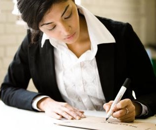 Woman Writing Affidavit